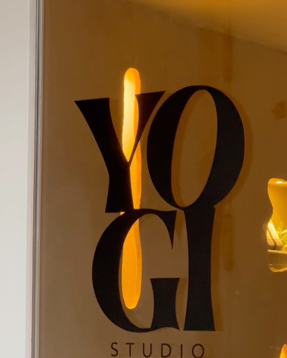 The YOGI reception wall with lit niches