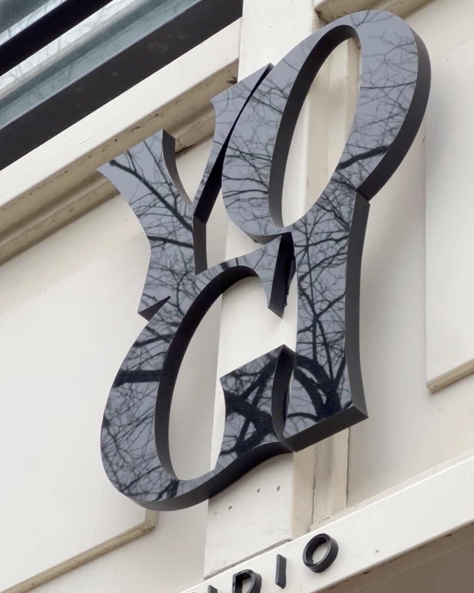 The YOGI Studio sign above the entrance on Brouwersgracht