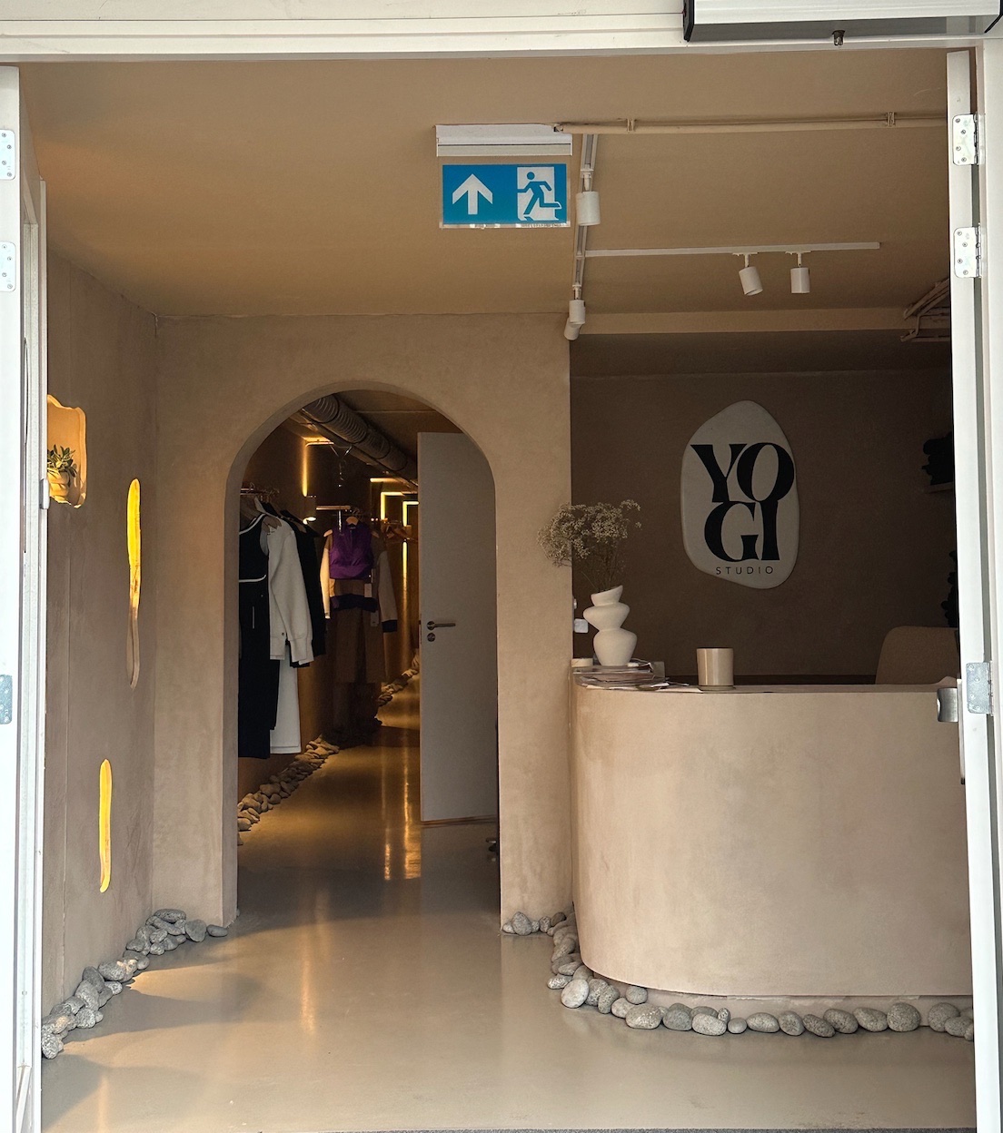 The YOGI entrance with the boutique arch and reception desk